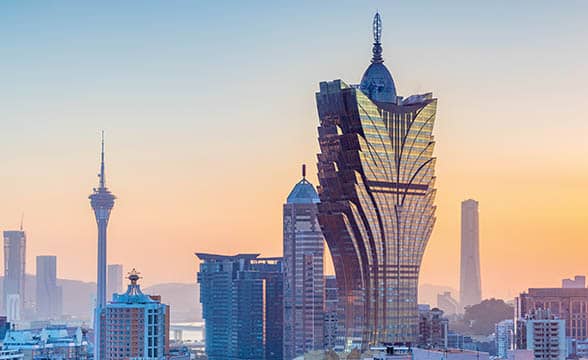 Macau Casino Stocks Fall as COVID Cases Boom